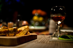 abstract lifestyle food photography bread and wine depth of field