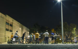 bicycle event people watching night event photography